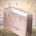 Bridal Shower rose gold glitter pink monogram Large Gift Bag<br><div class="desc">A gift bag for a girly and glamorous Bridal Shower, bachelorette party. A faux rose gold background with elegant pink and rose gold glitter drips, paint dripping look. Personalize and add a name and monogram letter. The name is written in burgundy with a modern hand lettered style script with swashes....</div>