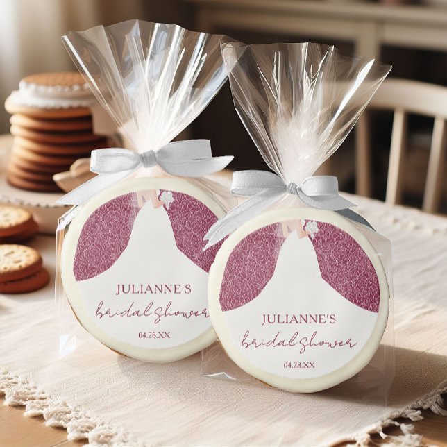 Bride in Gown on Cranberry Bridal Shower Sugar Cookie (Bridal shower cookies feature a bride on a white rose pattern over cranberry red background)