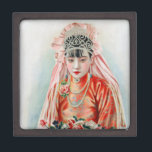 Bride in Red at Chinese Wedding in Shanghai Gift Box<br><div class="desc">The air crackled with the joyous anticipation of a wedding day. The young woman, Xiaohua, stood bathed in the warm glow of the room, a vision of youthful elegance. Her face, flawless with a touch of light makeup that emphasized her youthful features, was framed by a cascade of black hair...</div>