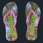 Bride Palm Trees Blue Sky Flip Flops<br><div class="desc">Cool Palm Trees with a Pretty Blue Sky in the background Unisex Flip Flops with Bride written in a nice green color text, and Date of Marriage in black text. PERSONALIZE with your Wedding DATE (or delete text). Feel the ocean breeze and tropics beneath your feet. Shown with Slim Pink...</div>