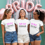 Bride Squad | Hot Pink Bachelorette Bridesmaid T-Shirt<br><div class="desc">Cute, simple, stylish "Bride Squad" quote art womens t-shirt with modern, minimalist typography in black and hot neon pink in a cool trendy style. The slogan, name and role can easily be personalized with the names of your bridal party, for example, bride, bridesmaids, flower girls, Mother of the Bride, Glam...</div>