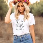 Bride to Be Black Modern Script Custom Wedding T-Shirt<br><div class="desc">Modern and casual chic black calligraphy script "Bride to Be" women's bridal wedding tee shirt features custom text that can be personalized with the bride's first name. Perfect for the bride to wear at the bachelorette party and the wedding weekend!</div>
