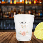 Bride to be rose gold floral eucalyptus greenery shot glass<br><div class="desc">For a bridal shower or a bachelorette party. Decorated with a rose gold, blush pink floral, flower (rose)and green watercolored eucalyptus leaves, sprigs, greenery and a faux gold sprig. Personalize and add the name of the bride. Black and golden letters. With the text: Bride to be. The word to be...</div>