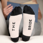Bride Wedding Party Pink and Black Socks<br><div class="desc">Typography Wedding Party Socks Groom The Bride on Bottom Socks. Bride's custom socks,  Team Bride,   Wedding party gifts,  Wedding party socks,  Funny wedding party gift,  wedding humor,  team and name of bride,  unique wedding party gifts,  custom wedding party gifts</div>