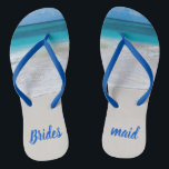 Bridesmaid Beach Wedding Flip Flops<br><div class="desc">Bridesmaid's flip flops with a photo of a white sandy beach and turquoise ocean water.  Brides maid done in blue text is fully customizable to suit your needs.</div>