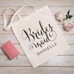 Bridesmaid Black Script Personalized Wedding Tote Bag<br><div class="desc">Wedding Bridesmaid tote bag features modern black swirling calligraphy script writing with elegant custom first name text that you can personalize. See our coordinating bridal party designs!</div>