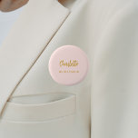 Bridesmaid blush pink name tag button<br><div class="desc">A blush pink background color.  Personalize and add your bridesmaid's name.  Golden handwritten style script.</div>