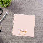 Bridesmaid blush pink notebook<br><div class="desc">A blush pink background color.  Personalize and add your bridesmaid's name.  Golden handwritten style script.</div>