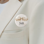 Bridesmaid bow beige cream name tag button<br><div class="desc">A beige,  cream colored background. Decorated with a large bow.  Personalize and add your bridesmaid's name.   Black handwritten style script.</div>