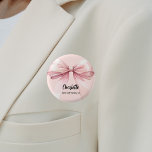 Bridesmaid bow pink name tag button<br><div class="desc">A soft blush pink colored background. Decorated with a large bow.  Personalize and add your bridesmaid's name.   Black handwritten style script.</div>
