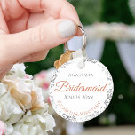 Bridesmaid Coral & Silver Lace White Wedding Gift Keychain<br><div class="desc">These keychains are designed to give as favors to bridesmaids in your wedding party. They feature a simple yet elegant design with a white background, terracotta or coral orange and gray text, and a silver faux foil floral lace border. There is space for her name, the names of the couple,...</div>