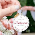 Bridesmaid Elegant Wedding Gift Red & White Keychain<br><div class="desc">These keychains are designed to give as favors to bridesmaids in your wedding party. They feature a simple yet elegant design with a white background, crimson red & Gray text, and a silver faux foil floral border. Perfect way to thank your bridesmaids for being a part of your special day!...</div>