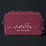 Bridesmaid Gift Burgundy Dopp Kit<br><div class="desc">This Bridesmaid accessory bag features a handwritten white script typography with swashes on a caramel background. Present your bridesmaids with a toiletry bag for their makeup and small items traditionally presented at the rehearsal dinner,  for use in the early morning before the wedding.</div>