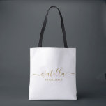 Bridesmaid Gift Gold Name Tote Bag<br><div class="desc">This Bridesmaid makeup and accessory bag features a handwritten gold script typography with swashes on a midnight or white background. Present your bridesmaids with a toiletry bag for their makeup and small items traditionally presented at the rehearsal dinner,  for use in the early morning before the wedding.</div>