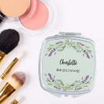 Bridesmaid lavender florals eucalyptus sage green compact mirror<br><div class="desc">A sage green background. Decorated with lavender flowers and eucalyptus greenery.  Personalize and add your bridesmaid's name.   Black handwritten style script.</div>