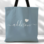 Bridesmaid Modern Script Heart Dusty Blue Tote Bag<br><div class="desc">This chic tote bag features a beautiful Dusty Blue background adorned with a modern script font and a delicate heart design. The soft, elegant color and sophisticated typography make it an ideal accessory for bridesmaids or anyone who loves stylish and trendy designs. Perfect for carrying essentials, this tote bag adds...</div>