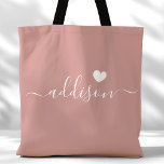 Bridesmaid Modern Script Heart Dusty Rose Tote Bag<br><div class="desc">This chic tote bag features a beautiful dusty rose background adorned with a modern script font and a delicate heart design. The soft, elegant color and sophisticated typography make it an ideal accessory for bridesmaids or anyone who loves stylish and trendy designs. Perfect for carrying essentials, this tote bag adds...</div>