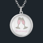 Bridesmaid Pink Champagne Wedding Party Necklace<br><div class="desc">Necklace features an original marker illustration of two glasses of bubbly pink champagne,  with BRIDESMAID in a fun font. A great bridesmaid / bridal party gift!</div>