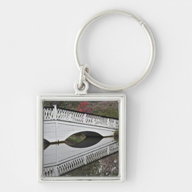 Bridge reflecting on pond, Magnolia Keychain (Front)