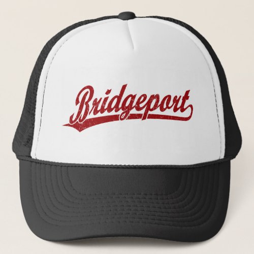 Bridgeport script logo in red trucker hat