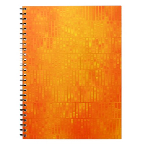 Bright abstract mosaic orange background with glos notebook