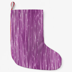 Bright abstract pink background with glitter small christmas stocking