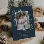 Bright Boughs | Botanical Christmas Photo Holiday Card<br><div class="desc">Elegant and festive holiday photo card frames your favorite vertical or portrait oriented image with a subtle deckled edge border and white and green holiday foliage peeking out at the corners. "Merry Christmas" or your choice of greeting appears beneath, along with your family name, on a contrasting navy blue background....</div>
