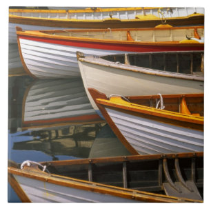 Bright colored boats at the Wooden Boat Center Ceramic Tile
