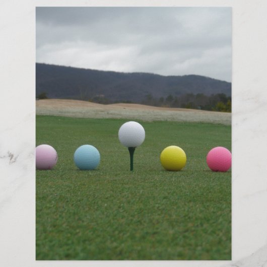 bright colored Golf Balls on a mountain (Front)