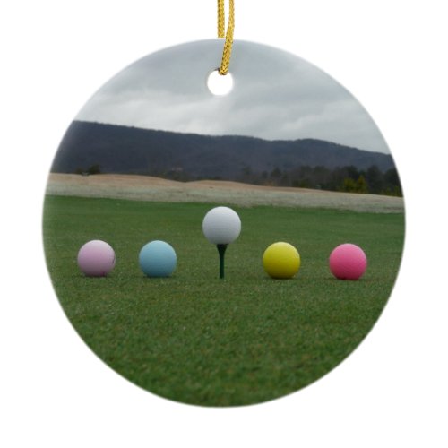 bright colored Golf Balls on a mountain Ceramic Ornament