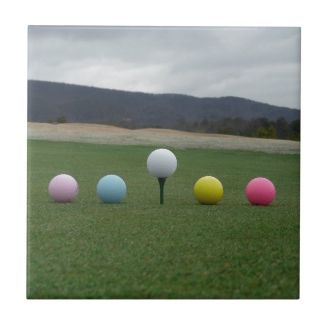 bright colored Golf Balls on a mountain Ceramic Tile (Front)