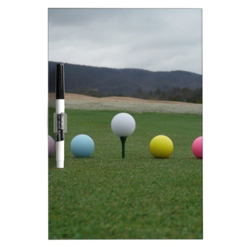bright colored Golf Balls on a mountain Dry Erase Board