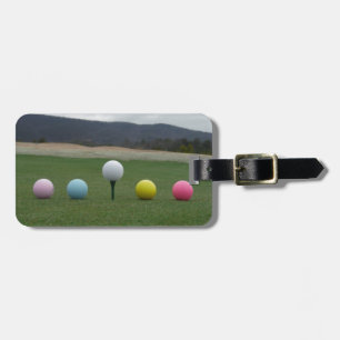 bright colored Golf Balls on a mountain Luggage Tag