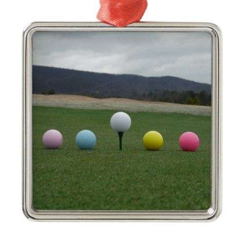 bright colored Golf Balls on a mountain Metal Ornament