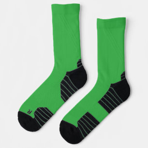 bright green crew socks with black toes and heels