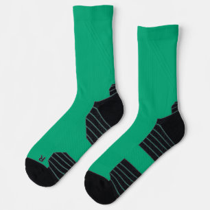 bright green socks with black heels and toes