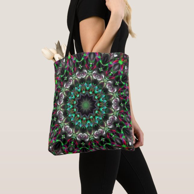 Bright hue on dark in medallion-style kaleidoscope tote bag (Close Up)