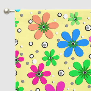 Bright multi-colored chamomile flowers on a yellow blackout curtains