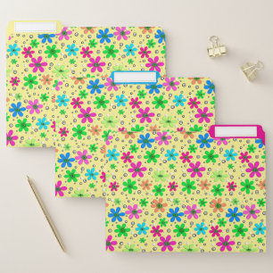 Bright multi-colored chamomile flowers on a yellow file folder