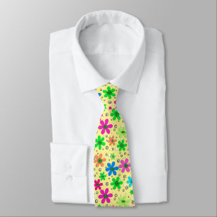 Bright multi-colored chamomile flowers on a yellow neck tie