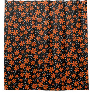 Bright orange flowers on a black background with w shower curtain