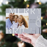 Bright Overlay | Modern Photo Silver Foil Holiday Card<br><div class="desc">A modern and colorful holiday card featuring a horizontal or landscape-oriented photo with "Merry & Bright" overlaid in oversized silver foil lettering. Personalize with your custom holiday greeting,  family name,  and the year. A chic and modern minimalist choice for your Christmas 2022cards.</div>
