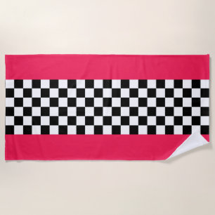 Bright pink and checkerboard beach towel