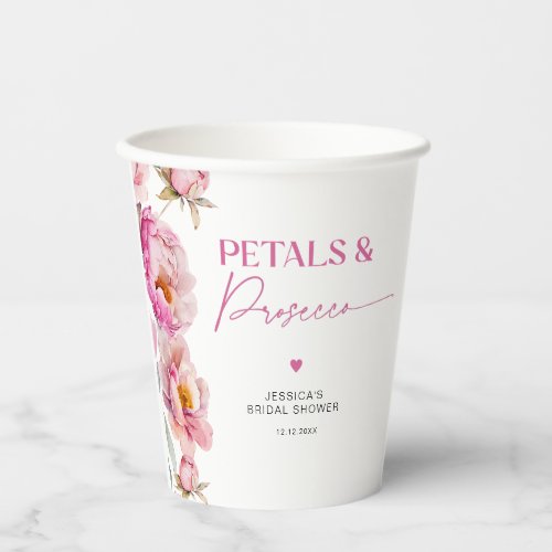 Bright pink floral petals and prosecco bridal paper cups