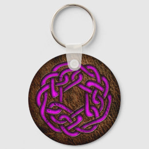 Bright purple celtic ornament on leather keychain
