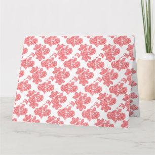 Bright red and pink floral wrapping paper featurin card