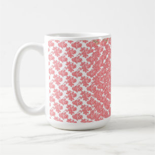 Bright red and pink floral wrapping paper featurin coffee mug