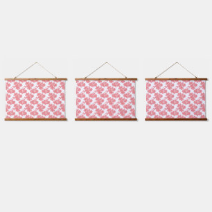 Bright red and pink floral wrapping paper featurin hanging tapestry