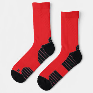 bright red crew socks with black toes and heels