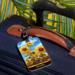 Bright sunflowers bloom under a clear blue sky luggage tag